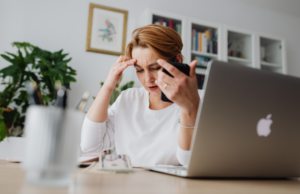 Person reviewing online account security settings to help prevent identity theft.