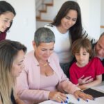 Family organizing important emergency documents in a home office.